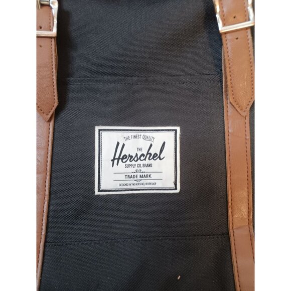 Herschel Black Backpack, Drawstring Close, Leather Snaps, Adjustable Straps - Picture 2 of 6